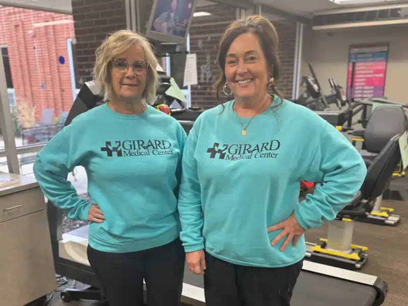 Two Girard Medical Center staff members in the cardiopulmonary rehab gym