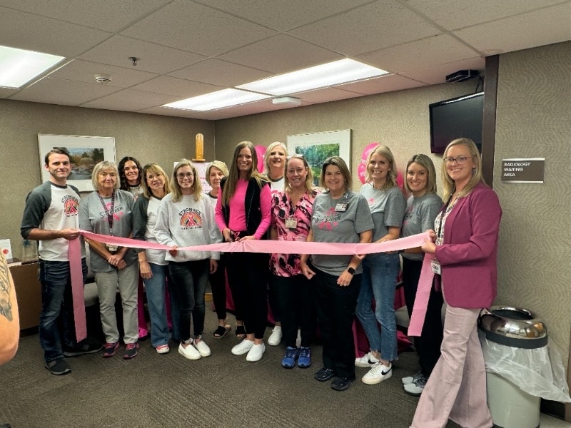 Girard Medical Center staff at a pink ribbon cutting for breast cancer awareness